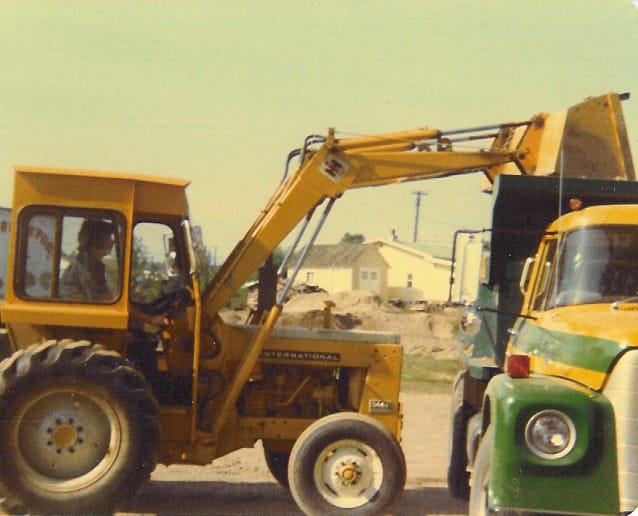 A yellow loader at work